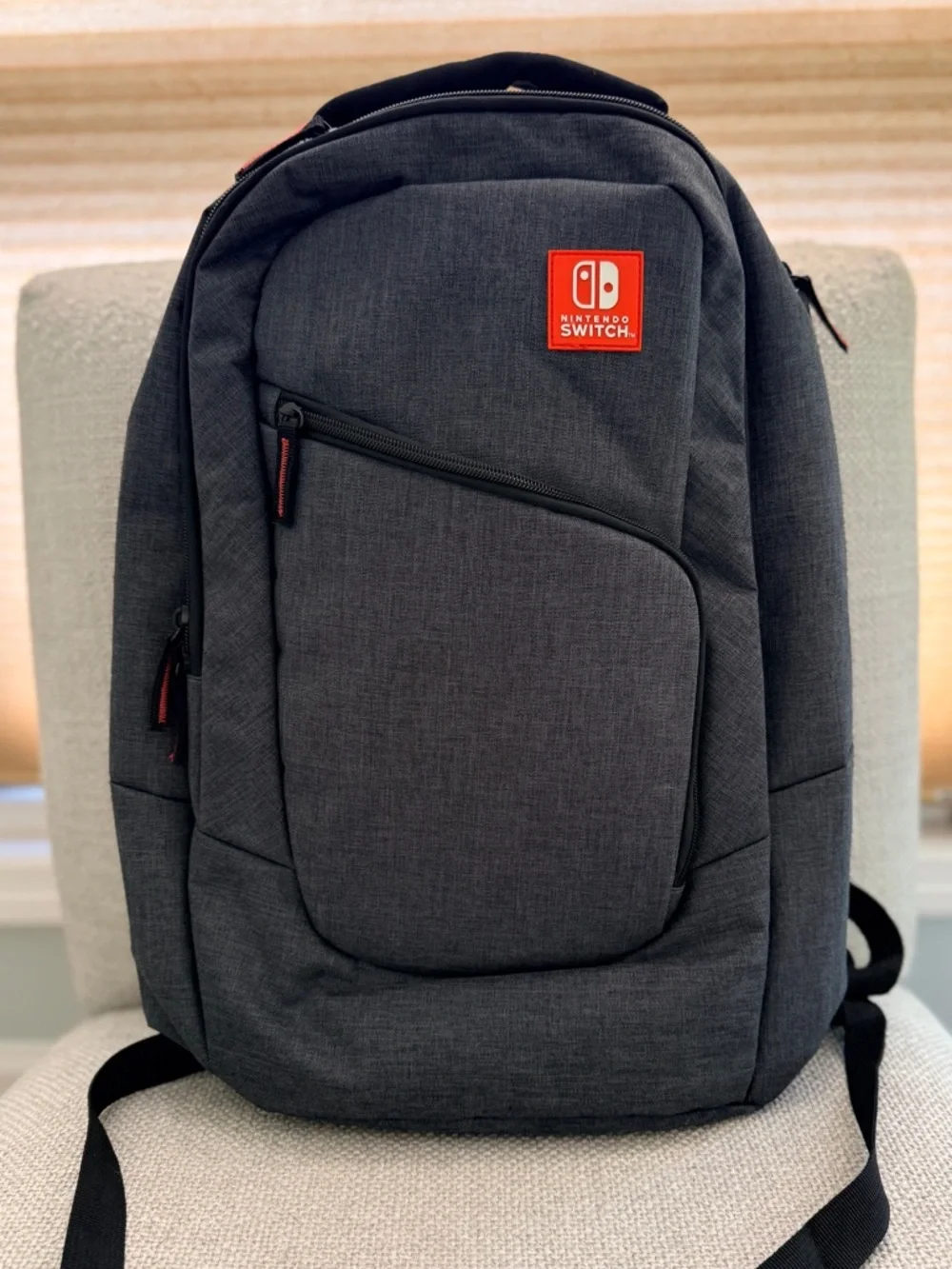 Nintendo Switch Gray Travel Backpack with Red Logo Accent